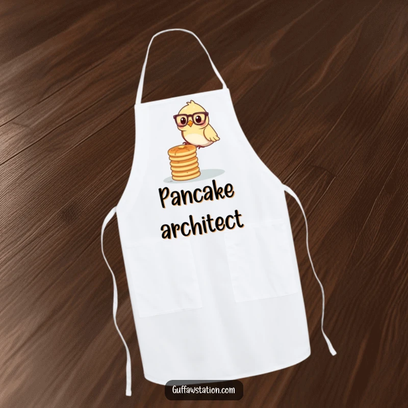 Funny bird in glasses attempting to balance a stack of pancakes on an apron, for humorous kitchen antics.