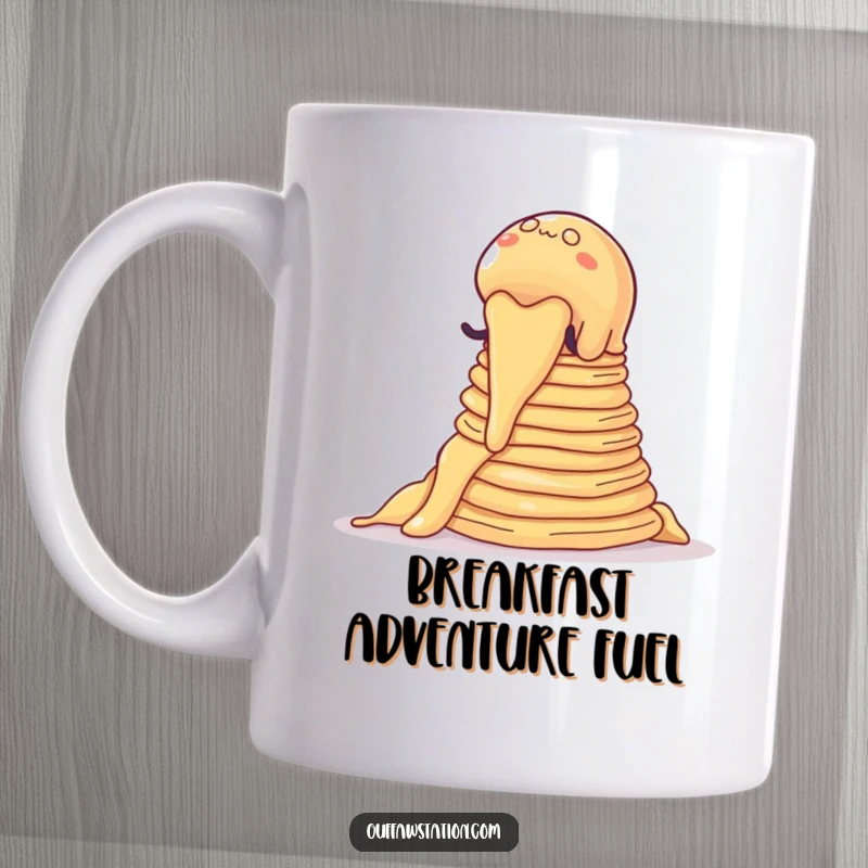 Funny mug showing a wobbly jelly blob attempting to climb a tall stack of pancakes, a humorous cartoon.