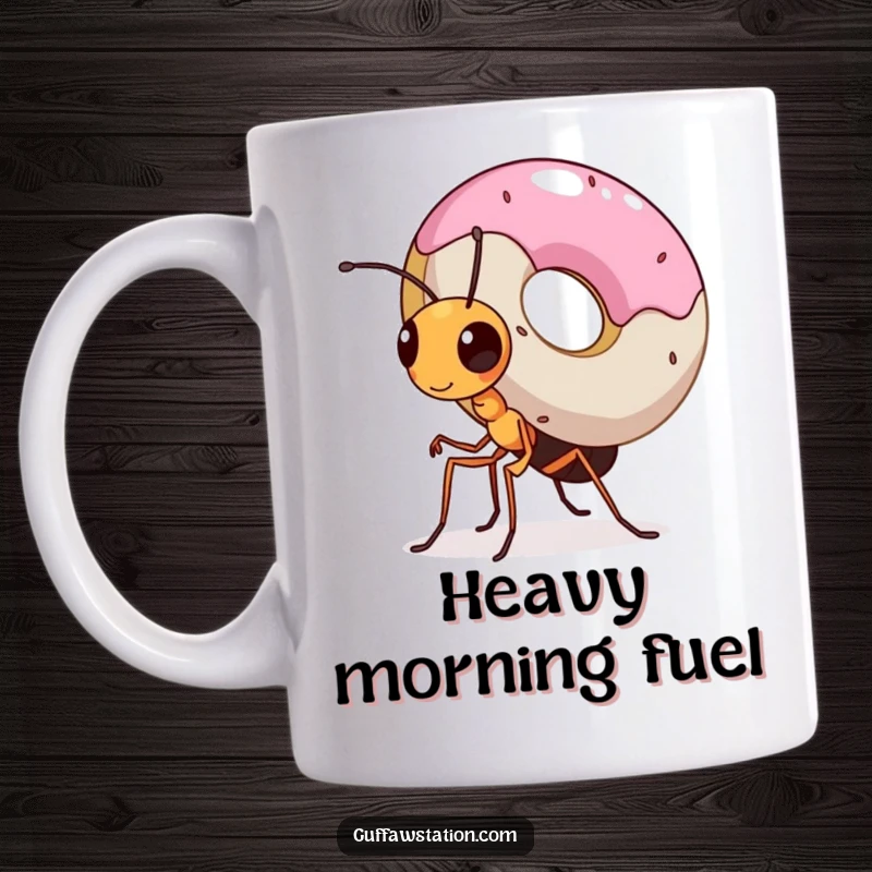 Funny mug showing a tiny, determined ant with immense effort carrying a giant donut on its back, showcasing incredible strength and focus.