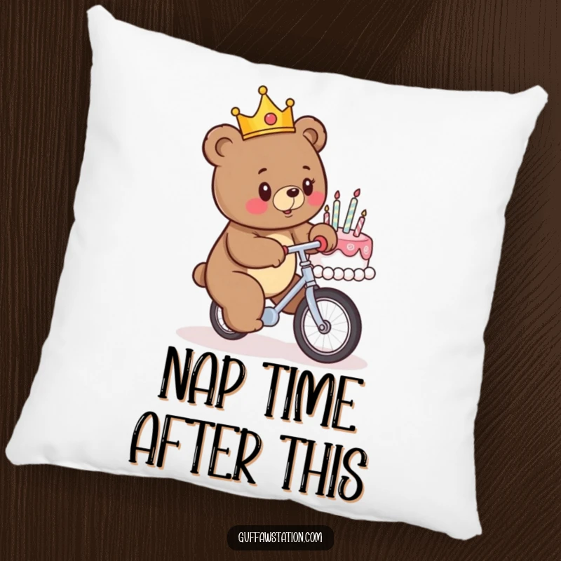 Funny decorative pillow showing a crowned bear attempting to unicycle into a birthday cake, a humorous and comfortable accent piece.