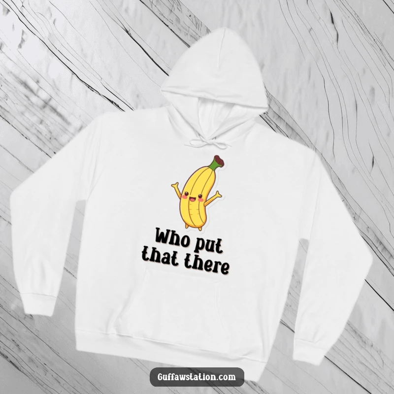 Funny Banana Slip Hoodie with a banana dramatically slipping on a peel, arms flailing, combining warmth with comedy.