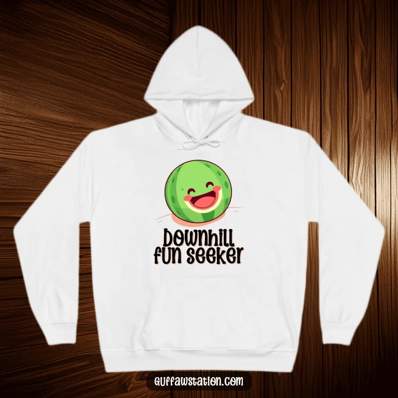 Funny hoodie depicting a happy watermelon with a wide grin rolling downhill, perfect for comfortable and cheerful wear.