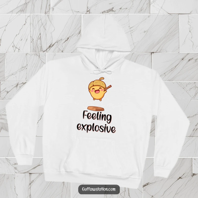 Funny hoodie with a determined acorn gleefully exiting a slingshot, radiating energy and a spirit of adventure.