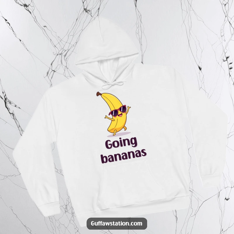 Funny happy banana wearing sunglasses, doing a cartwheel, printed on a soft and funny hoodie.