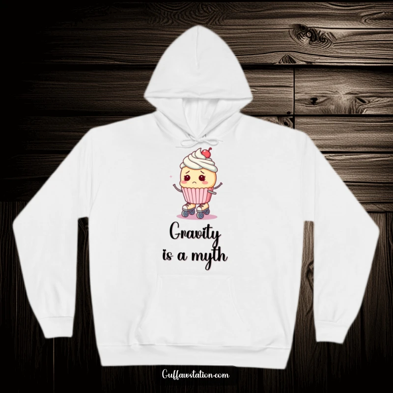 Funny hoodie featuring a bewildered cupcake wearing roller skates, on the verge of falling, perfect for comfort.