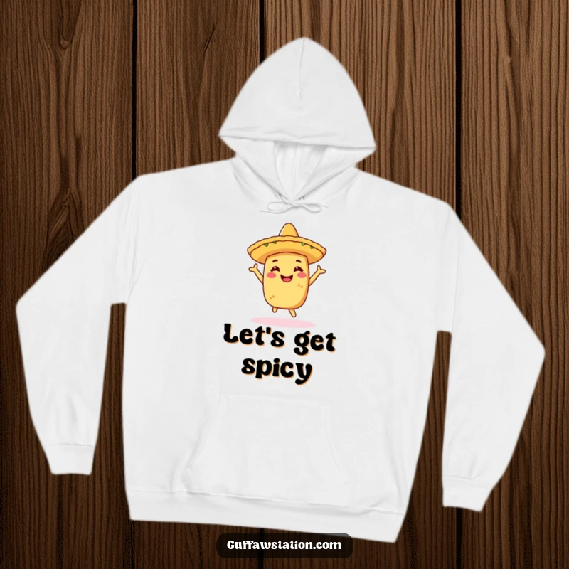 Funny hoodie depicting a cheerful taco wearing a sombrero, doing a lively celebratory dance, combining warmth with festive humor.