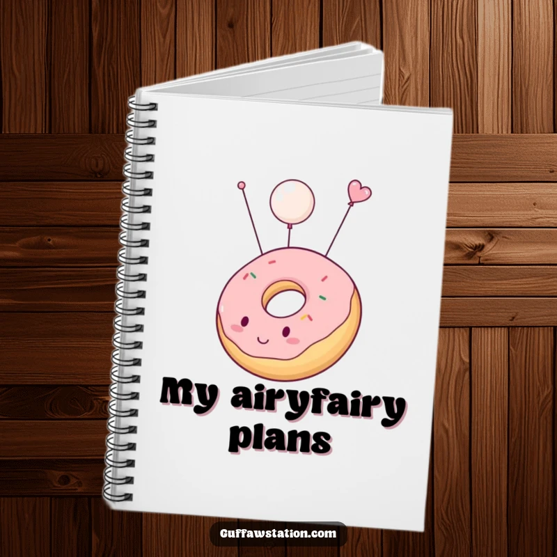 Funny notebook with a floating donut cover, perfect for jotting down notes, recipes, or sweet daydreams with humor.