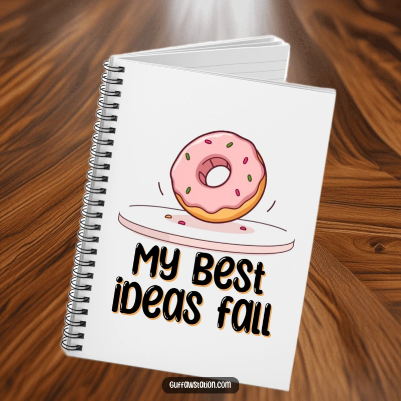Funny donut rolling off a table in slow motion on a notebook cover, inspiring humorous writing and creative doodling.