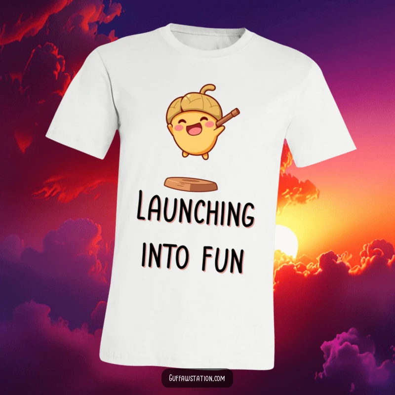 Funny t-shirt featuring a determined acorn joyfully propelled from a slingshot, symbolizing momentum and excited progress.