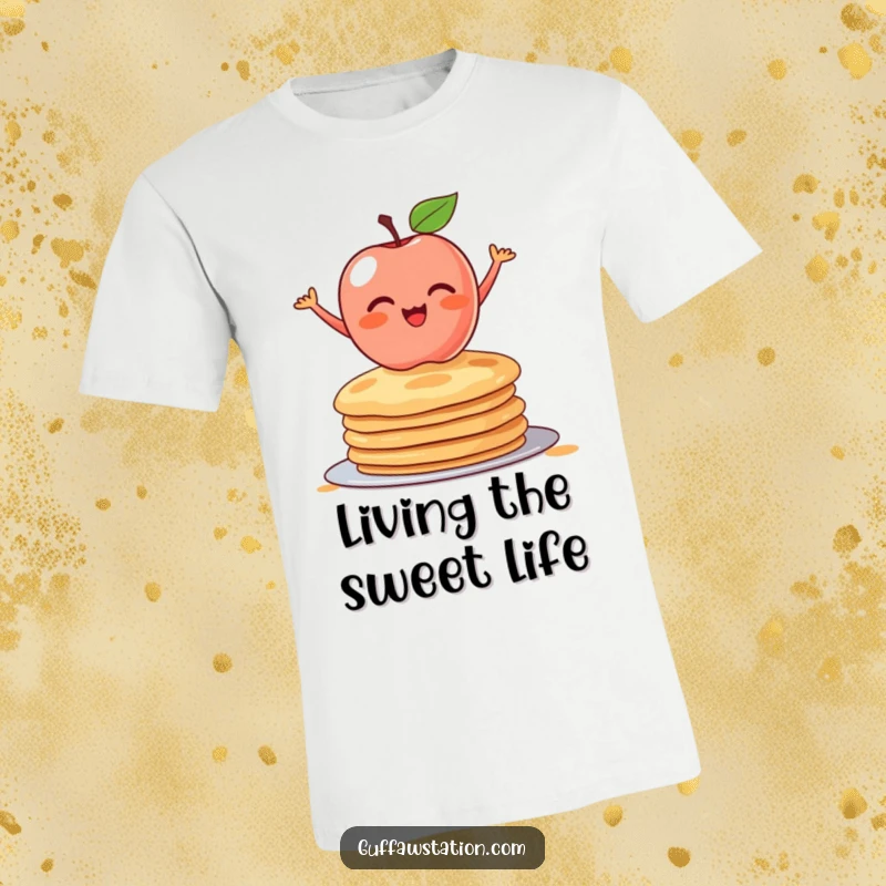 Funny t-shirt print of a blushing apple teetering on a stack of pancakes. Humorous food graphic for breakfast enthusiasts.