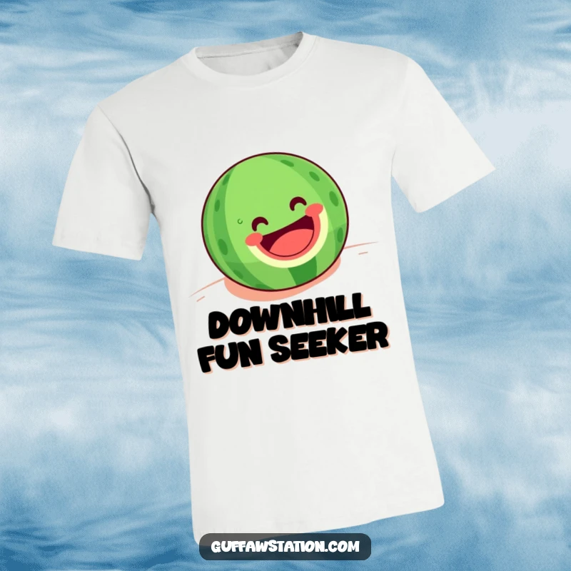 Funny t-shirt featuring a happy watermelon with a huge grin rolling downhill, symbolizing carefree summer fun and joy.