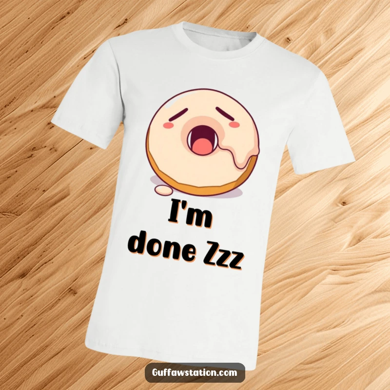 Funny sleepy donut with melting frosting yawning widely, printed on a comfortable and humorous graphic t-shirt.