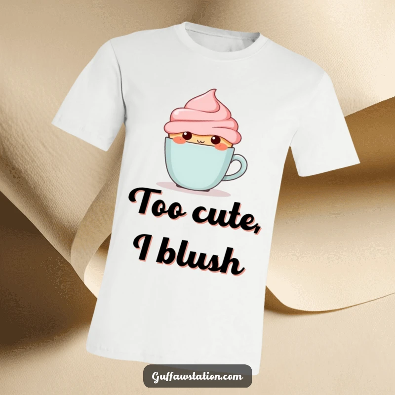 Funny blushing cupcake peeking from behind a tiny coffee cup, printed on a cute and humorous graphic t-shirt.